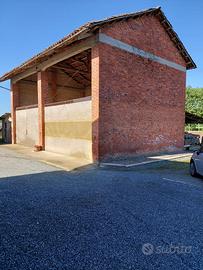 Portico con terreno