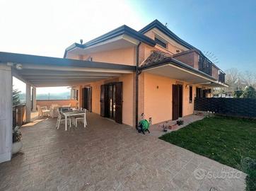 Villa a schiera con giardino
