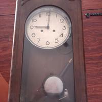 orologio a pendolo da muro