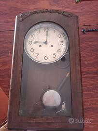 orologio a pendolo da muro