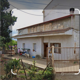 Casa con terreno annesso