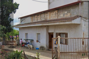 Casa con terreno annesso