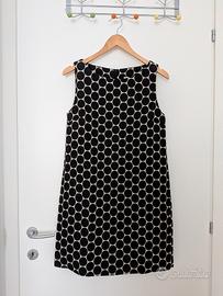 Vestito smanicato a pois neri