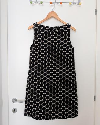 Vestito smanicato a pois neri