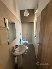 Stanza in ufficio condiviso