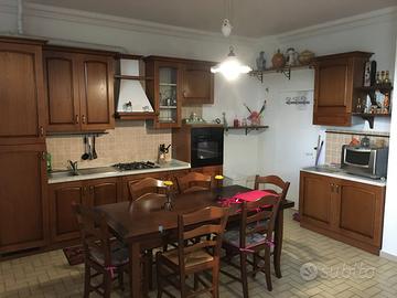 Monolocale p terra arredato no gas con posto auto