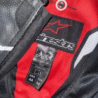 tuta e stivali alpinestar