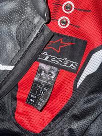 tuta e stivali alpinestar