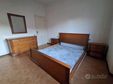 Camera matrimoniale, armadio, comò, comodini