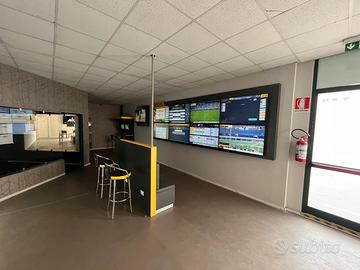 Agenzia scommesse con sala slot