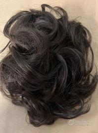 capelli ondulati voluminosi