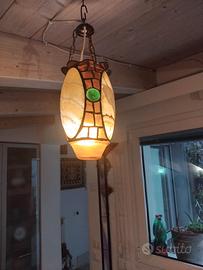 lampada in vetro e altro materiale