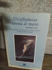 Un' affettuosa stretta di mano: Vittorio Pica.
