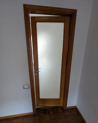 Porte in legno massello con vetro