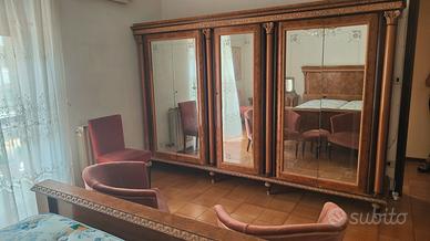 Camera da letto in radica di noce 