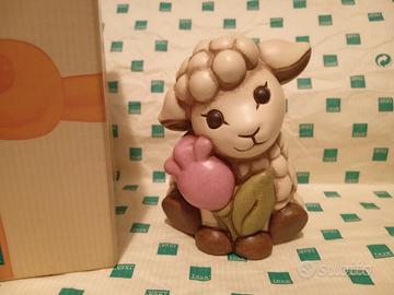 Agnello con fiore pasqua thun pecora