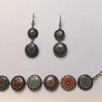 Bracciale e orecchini con motivo mandala