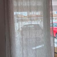 2 tende grigie 265x135 con anelli