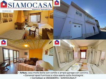 Casa molto bella con cortile e ampio box auto