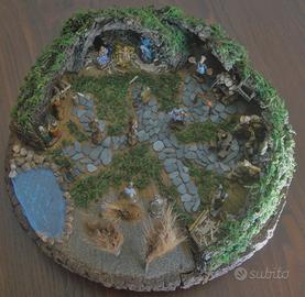 Presepe su cerchio di tronco d' albero