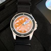 Orologio unimatic dial orange