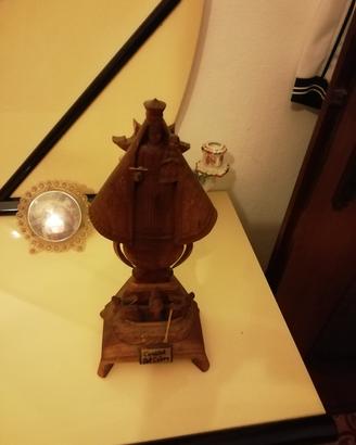 orologio particolare  e scultura  Fatta  a mano