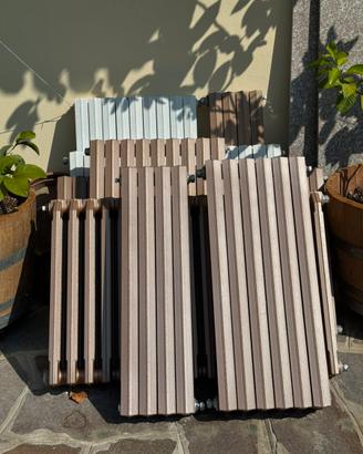 Termosifoni in ghisa di vari colori e dimensioni