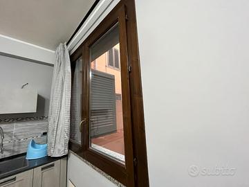 Infisso in legno piu veneziana