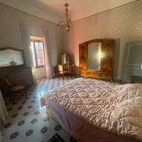 Camera completa in mogano