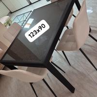 Tavolo allungabile nero e marmo