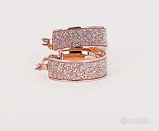 Orecchini stroili rosa in acciaio