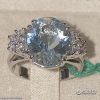 ANELLO ORO 18kt. DIAMANTI ED ACQUAMARINA OVALE