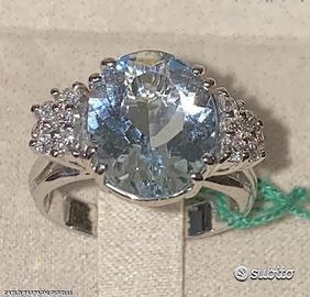 ANELLO ORO 18kt. DIAMANTI ED ACQUAMARINA OVALE