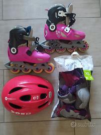 Pattini in linea per bambina, protezioni e casco