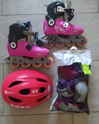 Pattini in linea per bambina, protezioni e casco