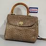 borsa-donna-pelle-puntini-manico-tp-bambo