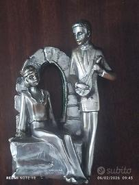 Statuina fermacarte in argento 925 e metallo.