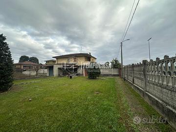 Ampio bilocale con giardino, cantina e box