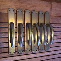 56 - Maniglie in ottone con placche e serrature