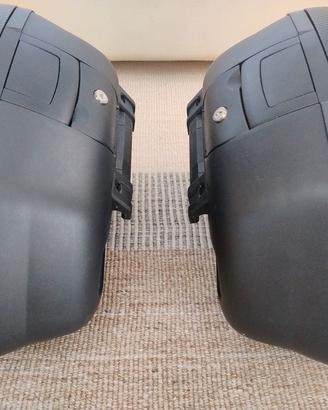 Shad valigie laterali capienti 