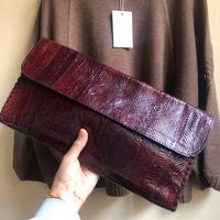 Pochette in pitone bordeaux