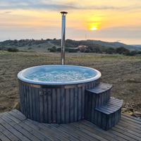 Vasca da esterno idromassaggio alimentataa legna