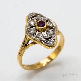 Anello in oro giallo 18 kt con pietre A.32