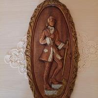 Vecchio quadro ovale in rilievo in gesso.