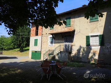 CASA SEMINDIPENDENTE CON RUSTICO E TERRENO.
