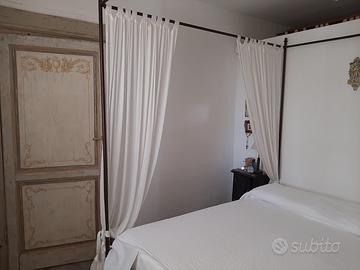 Letto a baldacchino