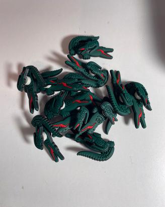 Lacoste spilla per crocs