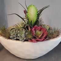 centro tavola con piante artificiali