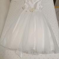 Vestito ed accessori prima comunione bambina.
