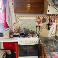 Cucina a gas con forno elettrico indesit